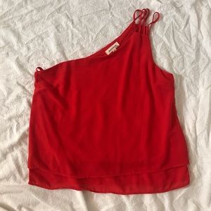 Red one-shoulder top with strap detail